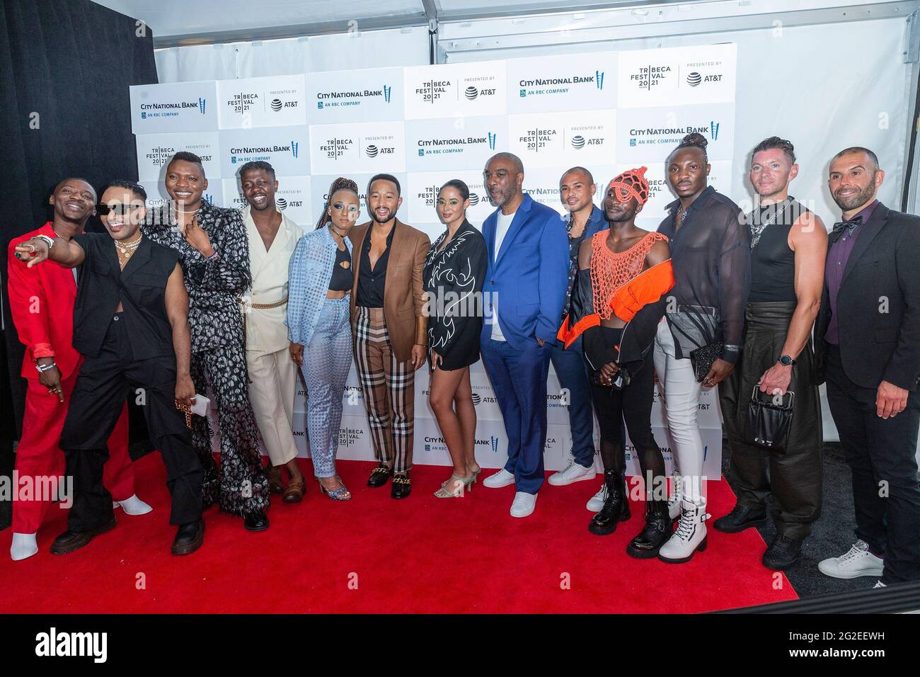 New York, United States. 10th June, 2021. Crew and subjects pose during The Legend of the Underground premiere at Tribeca Film Festival at Waterfront Plaza, Battery Park City. John Legend, producer of the film is 6th from the left, directors Nneka Onuorah (5th on the left) and Giselle Bauley (7th on the left). (Photo by Lev Radin/Pacific Press) Credit: Pacific Press Media Production Corp./Alamy Live News Stock Photo
