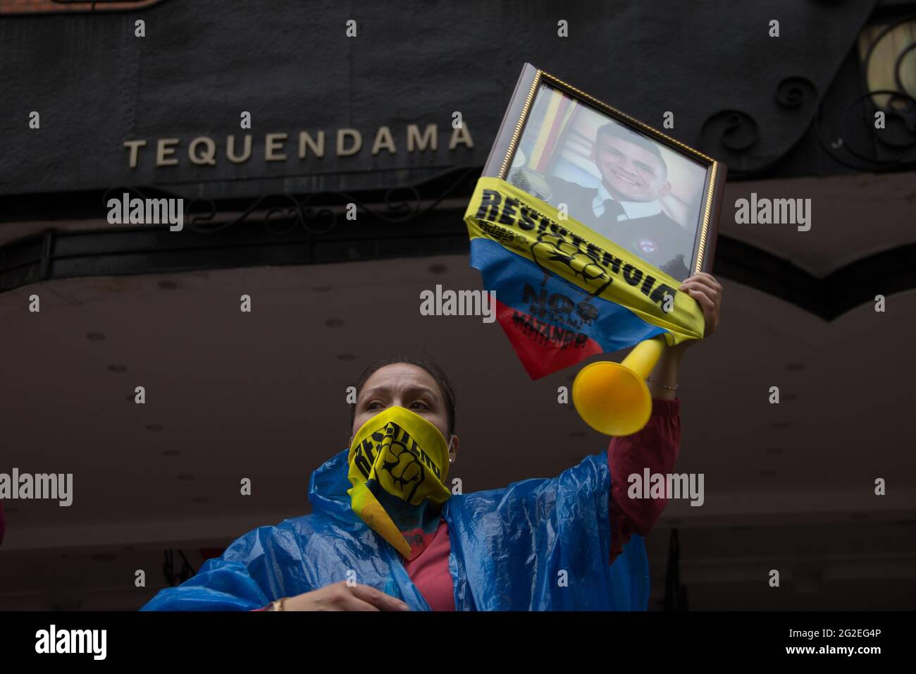 Mother of Dilan Cruz, dead in the protests of 2019, lifts a photo of her son as demonstrations took the entrance of the Tequendama Hotel during the United Nations and CIDH verification meetings amid anti-government protests in Colombia that lead to at least 70 dead in a month-lasting protests, on June 9, 2021 in Bogota, Colombia. Stock Photo
