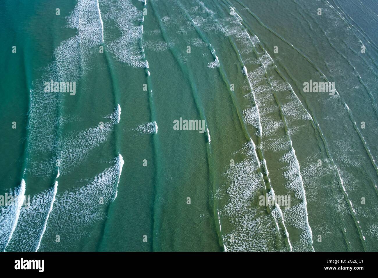 Wave patterns, Taieri Mouth, near Dunedin, Otago, South Island, New Zealand - drone aerial Stock Photo