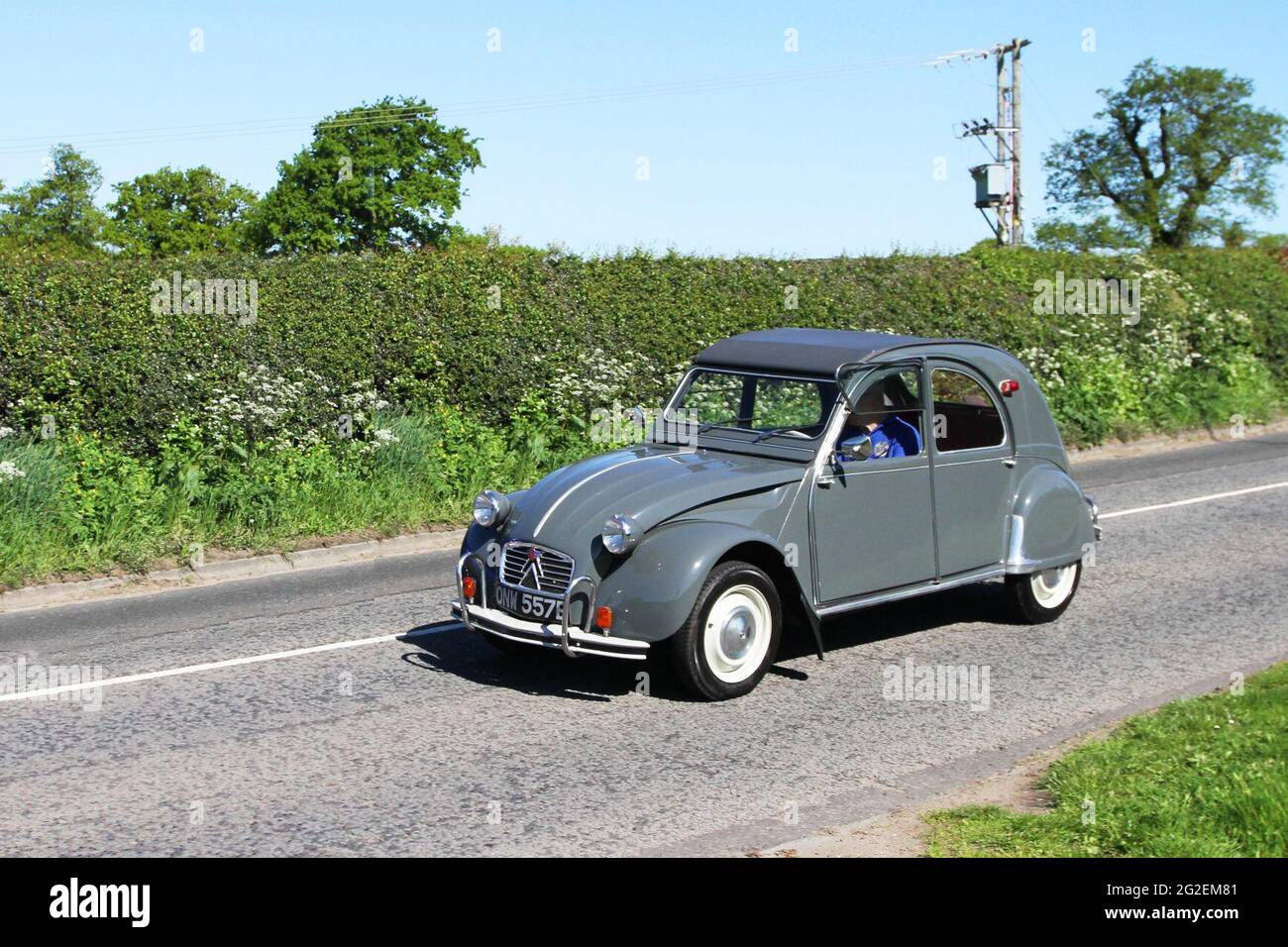 1964 60s Citroen 2CV grey 425cc petrol 4dr en-route to Capesthorne Hall classic May car show, Cheshire, UK Stock Photo