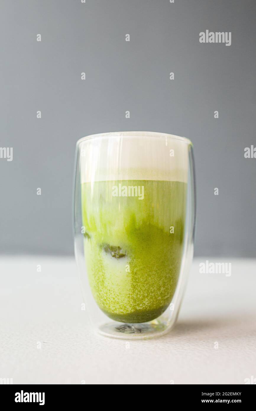 Matcha green tea with ice cubes Stock Photo