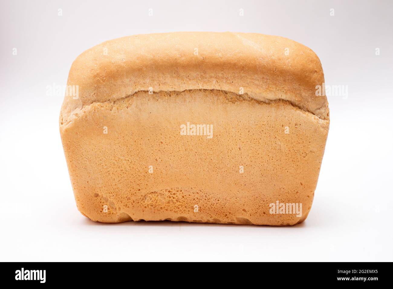Baked loaf of bread isolated on white background Stock Photo - Alamy
