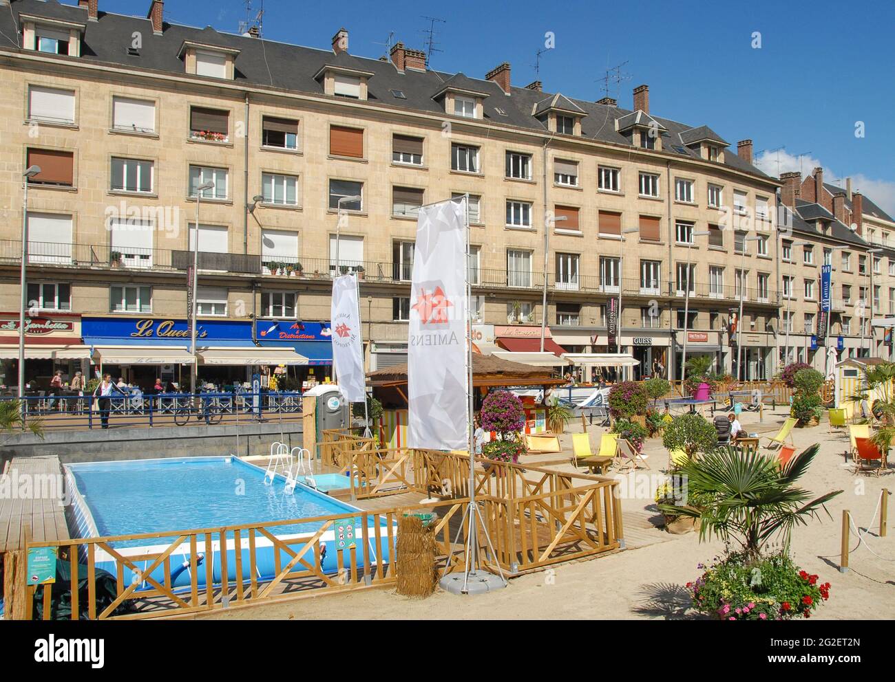 In summer, the city of Amiens sets up a pool in the city centre and invite strollers and locals to dip into the public pool and chill. France Stock Photo