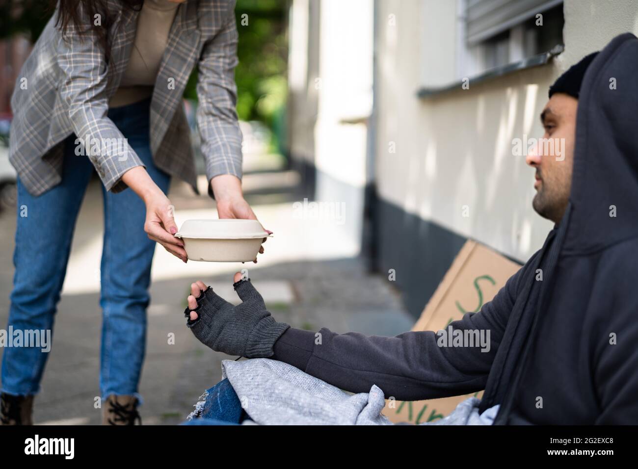 Homeless Food Help. Human Poverty. Poor Man Stock Photo