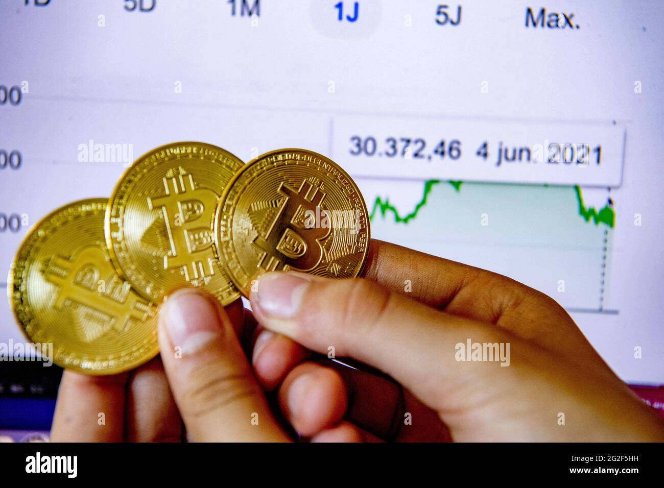 Illustration of Bitcoins in Netherlands on June 10, 2021. Bitcoin is a  cryptocurrency and a global means of payment. It is the first decentralized  digital currency that works without a central bank