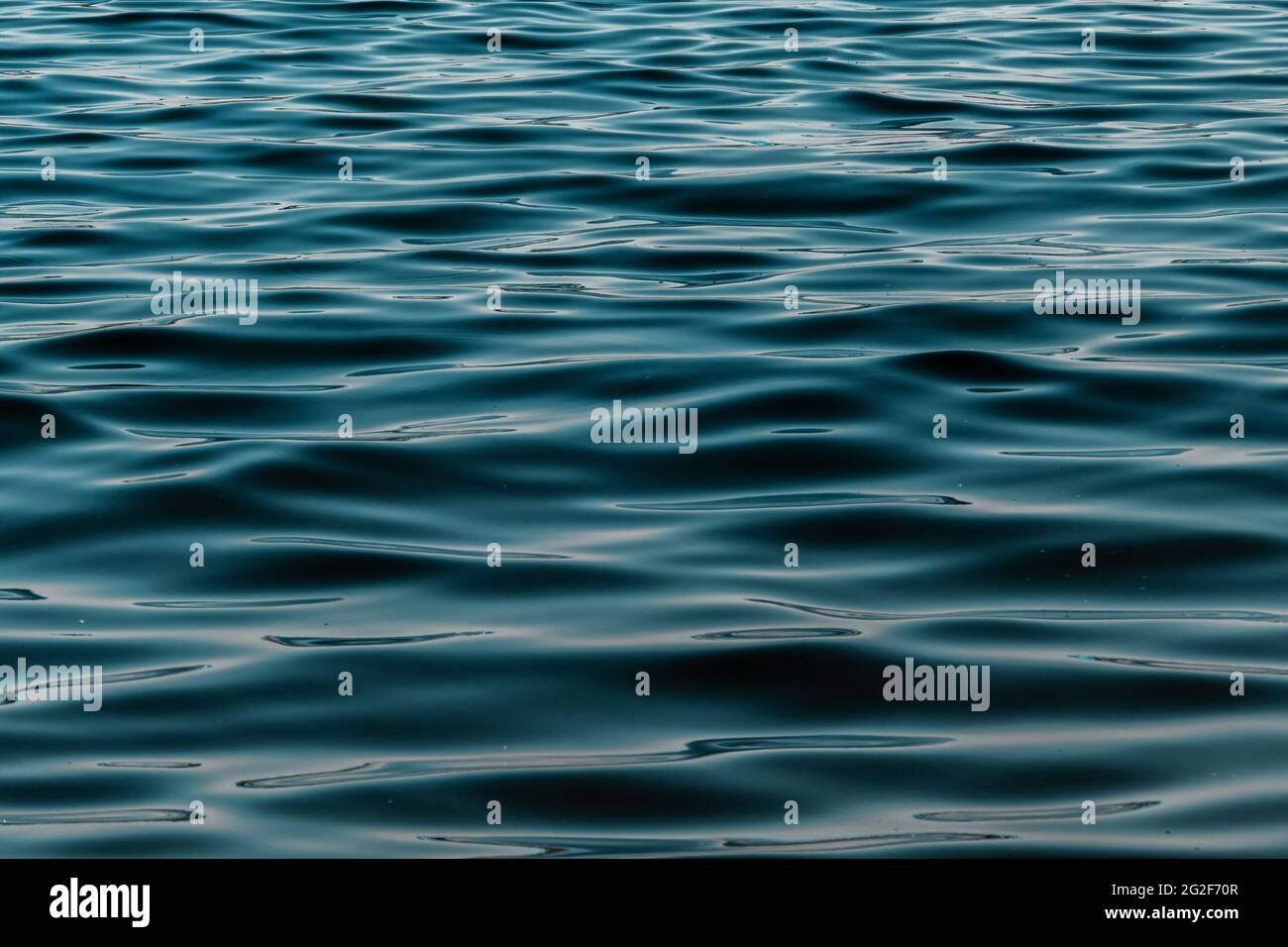 defocused blue water surface background Stock Photo