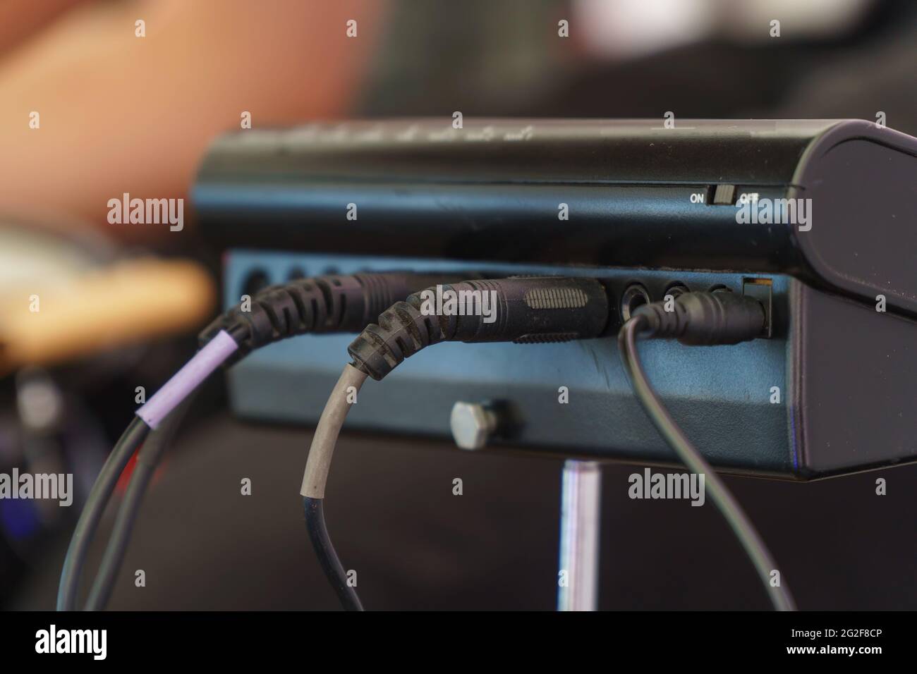 The wires are in a small mixing console. Rear view. Selective Focus ...