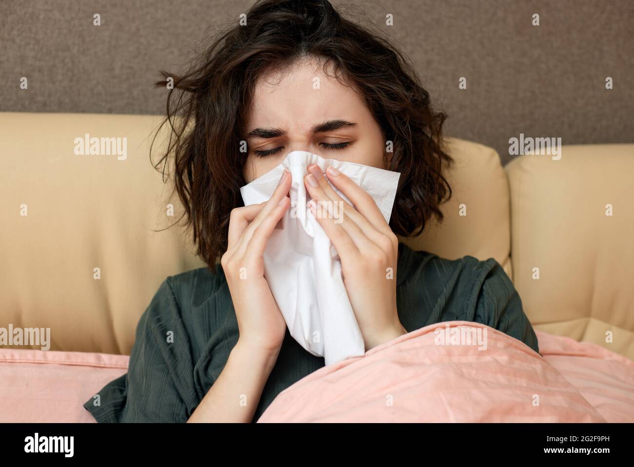 sick girl having influenza symptoms coughing at home Stock Photo Alamy