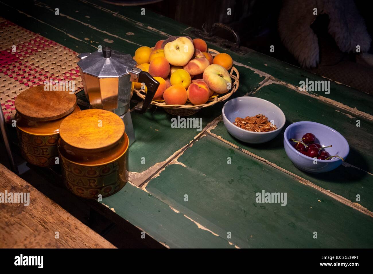 Fresh fruit, nuts and a moka pot on the kitchen counter --- A weekend at Brooklyn House, Martham Stock Photo