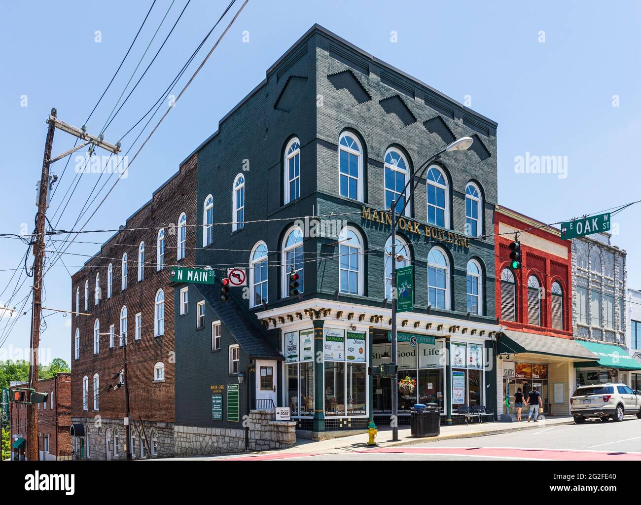 MT. AIRY, NC, USA-5 JUNE 2021: The Main-Oak Building, housing the Main-Oak Emporium with a variety of shops, eateries and entertainment venues.  Horiz Stock Photo