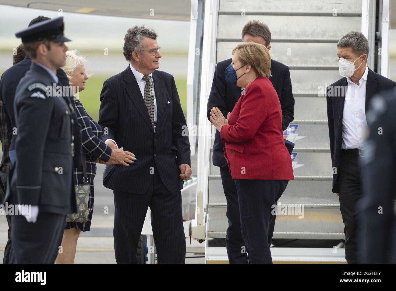 Newquay, UK. 11th June, 2021. Chancellor of Germany Angela Merkel and her husband, Joachim Sauer, arrive at Cornwall Airport Newquay on June 11, 2021, ahead of the G7 summit in Cornwall. Photo by Doug Peters/G7 Cornwall 2021/UPI Credit: UPI/Alamy Live News Stock Photo
