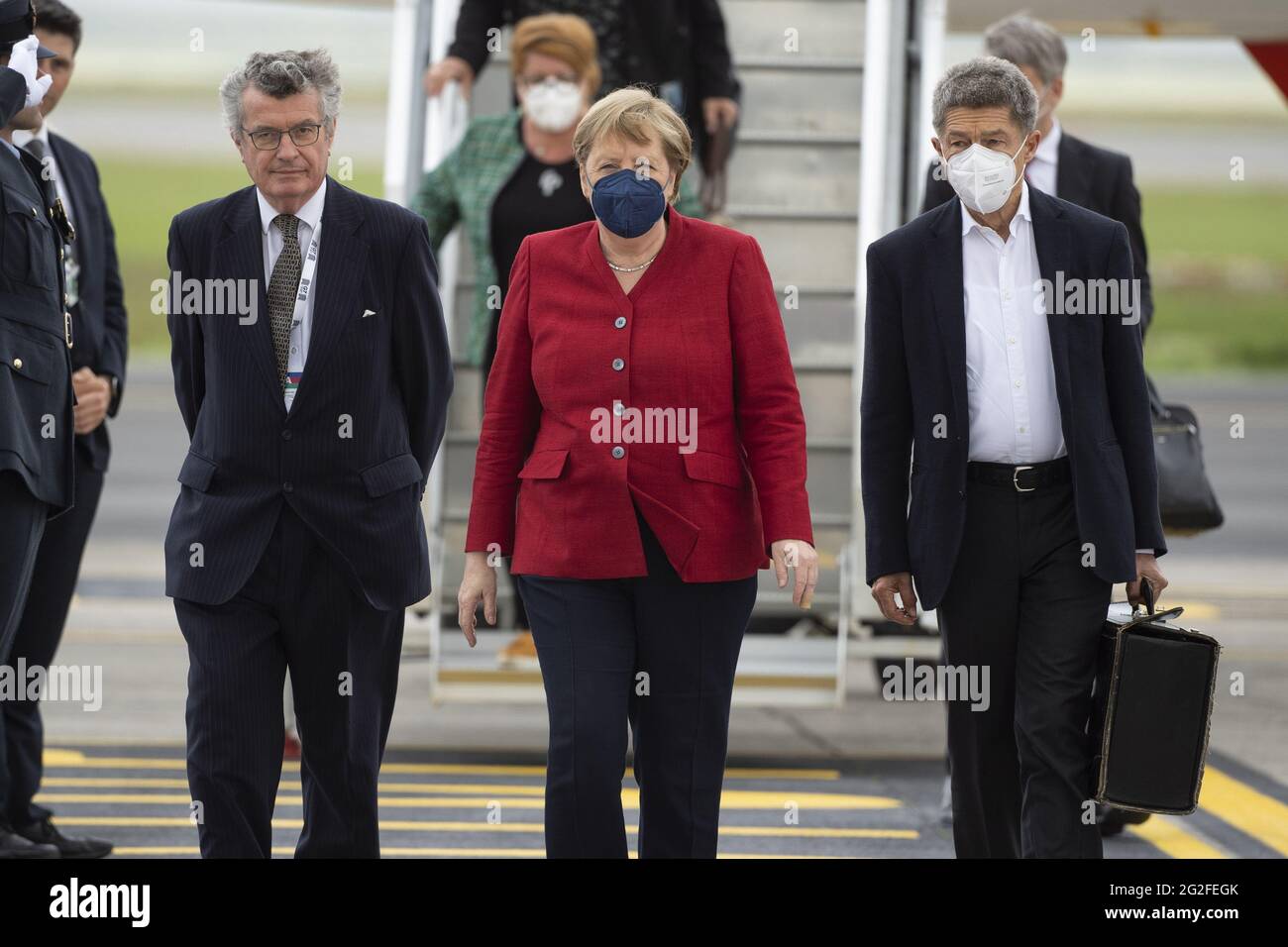 Newquay, UK. 11th June, 2021. Chancellor of Germany Angela Merkel and her husband, Joachim Sauer, arrive at Cornwall Airport Newquay on June 11, 2021, ahead of the G7 summit in Cornwall. Photo by Doug Peters/G7 Cornwall 2021/UPI Credit: UPI/Alamy Live News Stock Photo