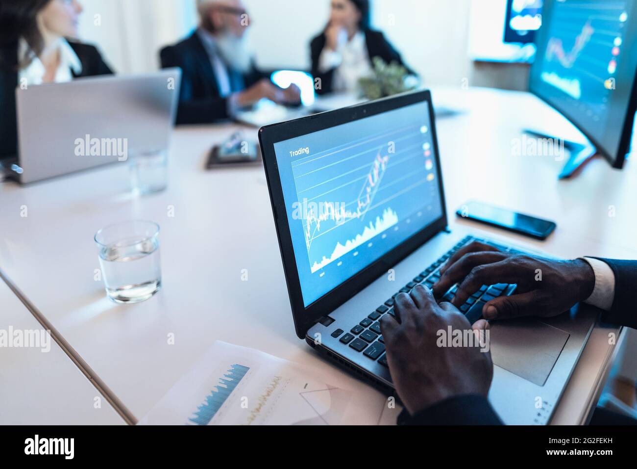 Business stock traders people in meeting room working on crypto currency  markets with blockchain technology Stock Photo - Alamy