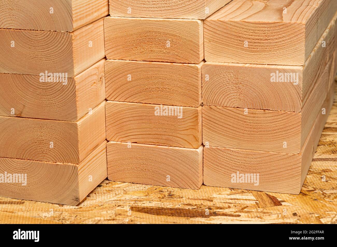 Closeup of construction lumber boards. Building materials price increase, home construction and remodeling cost concept. Stock Photo