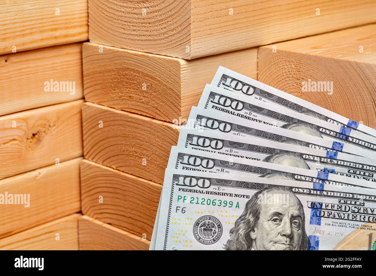 Construction lumber with cash money. Building materials price increase