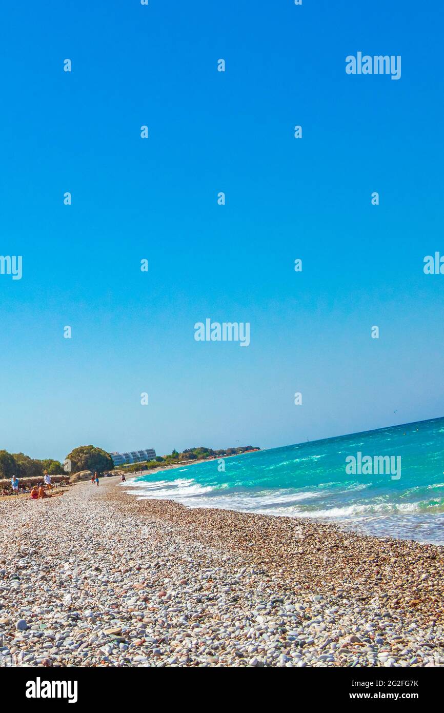 Relax windsurfing and vacation in Rhodes in Greece and the beautiful clear turquoise waters of Ialysos beach. Stock Photo