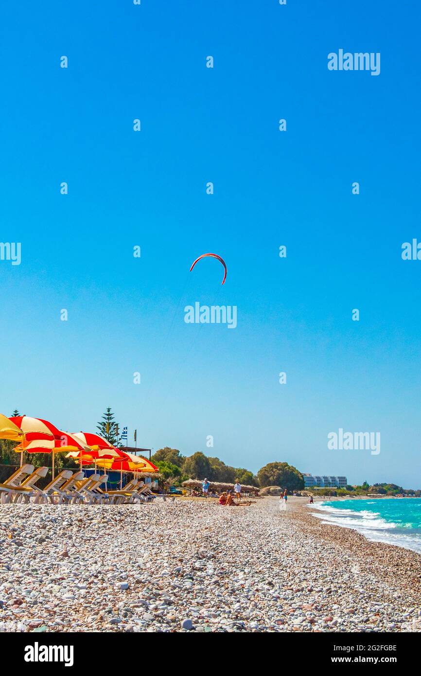 Relax windsurfing and vacation in Rhodes in Greece and the beautiful clear turquoise waters of Ialysos beach. Stock Photo