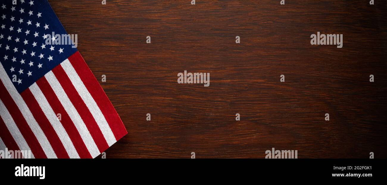 American flag for Memorial Day or 4th of July on dark wooden background ...