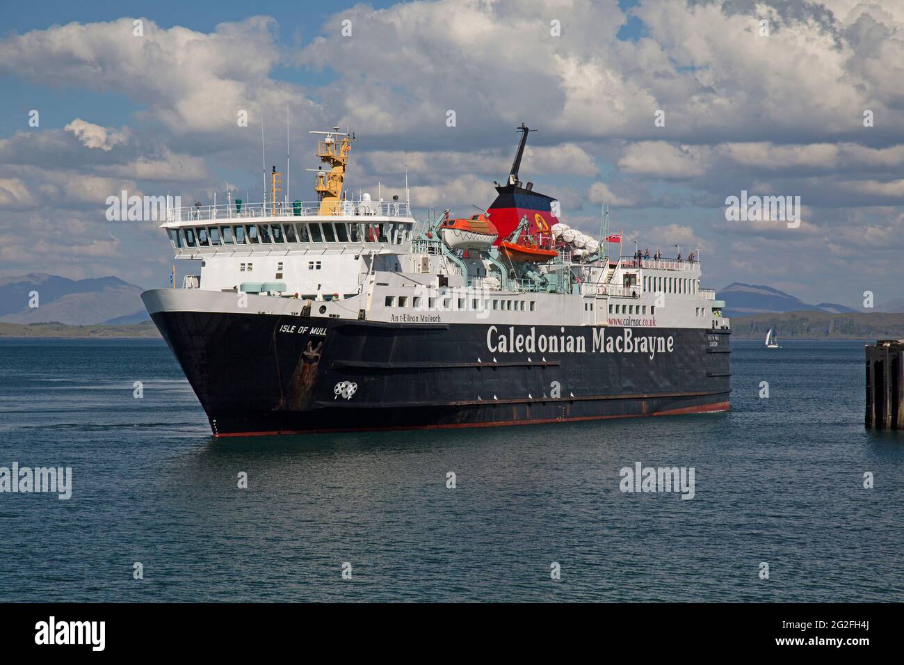 The Caledonian MacBrayne passenger and vehicle ferry 'Isle of Mull, in the sea in the Inner Hebrides of Scotland. Stock Photo