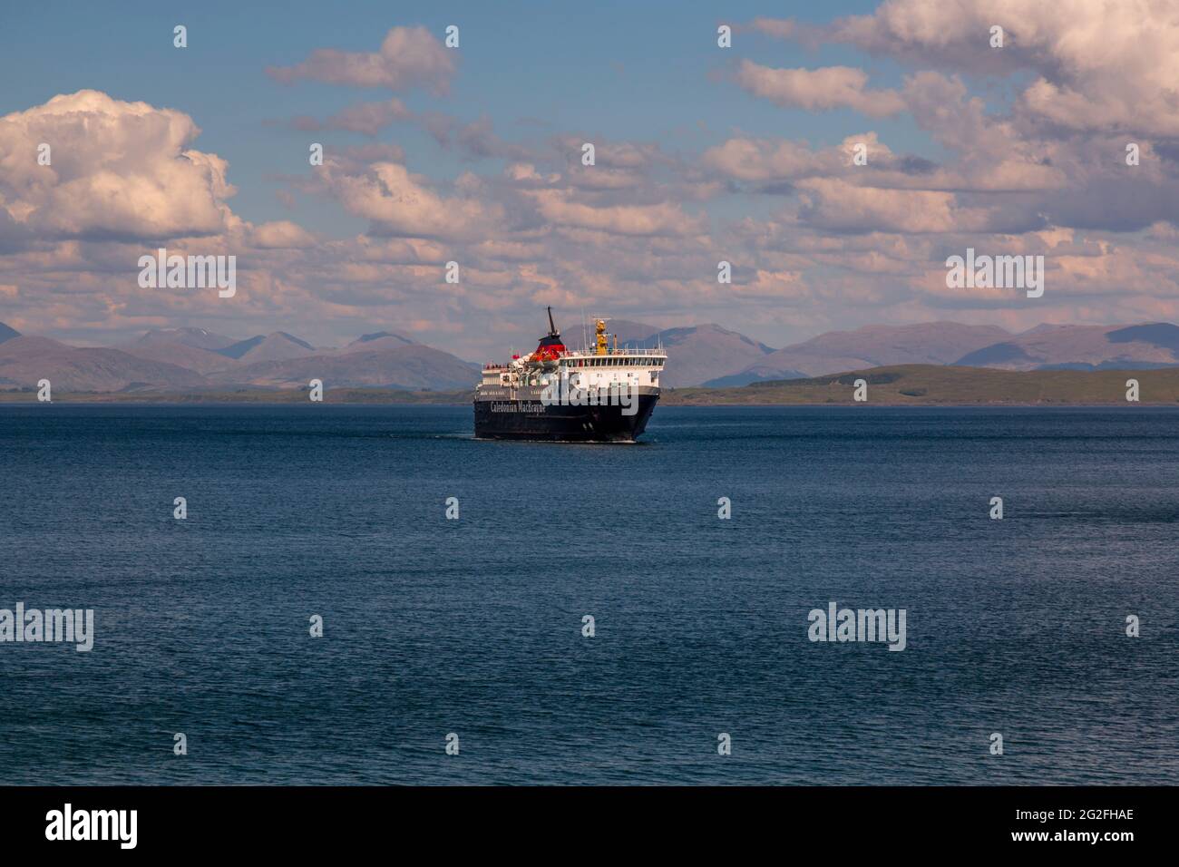 The Caledonian MacBrayne passenger and vehicle ferry 'Isle of Mull, in the sea in the Inner Hebrides of Scotland. Stock Photo