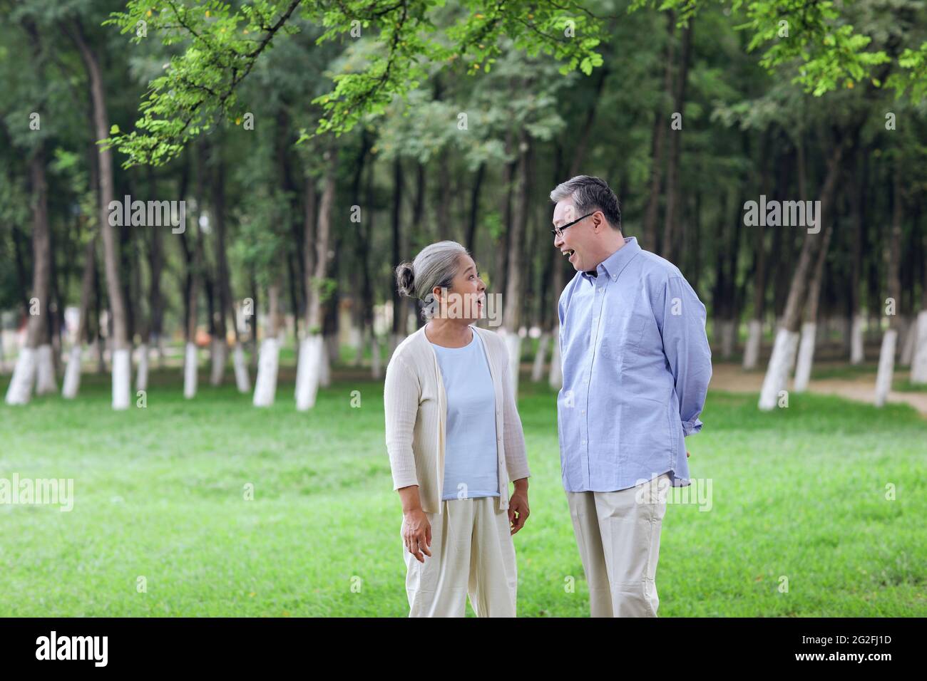 Happy old couple walking in the park high quality photo Stock Photo - Alamy