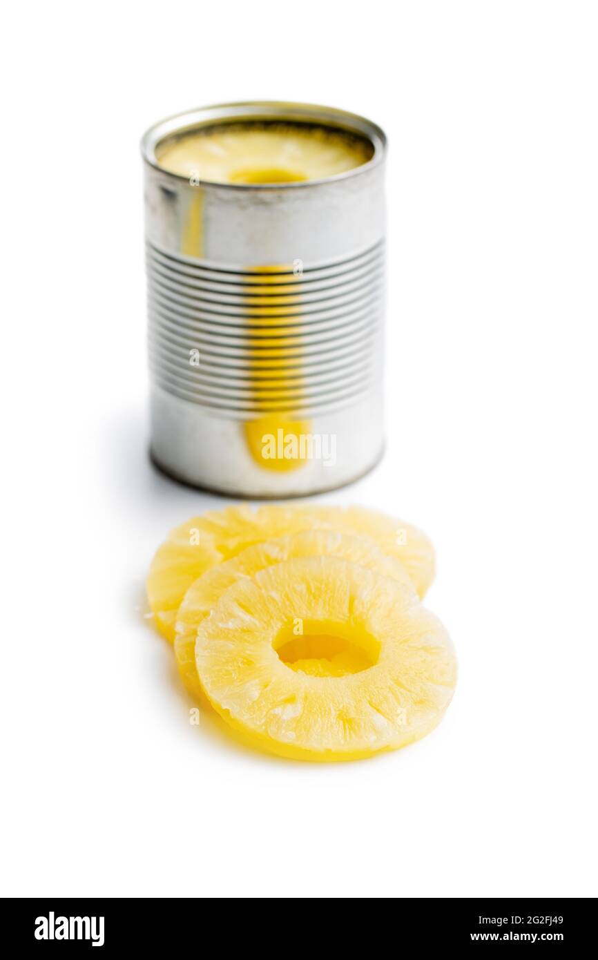 Canned sliced pineapple fruit isolated on white background. Stock Photo