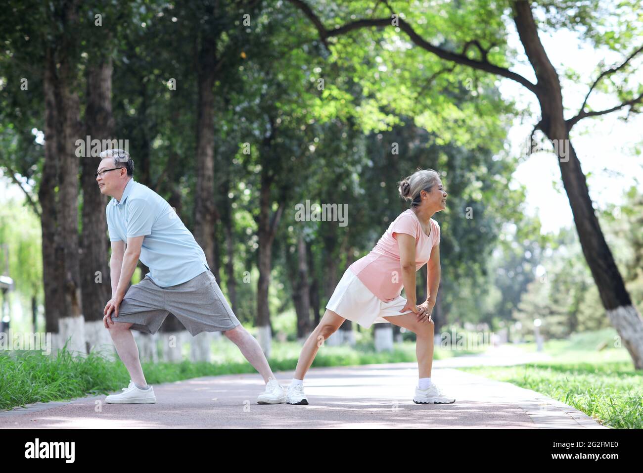 Old couple sports in the park high quality photo Stock Photo - Alamy