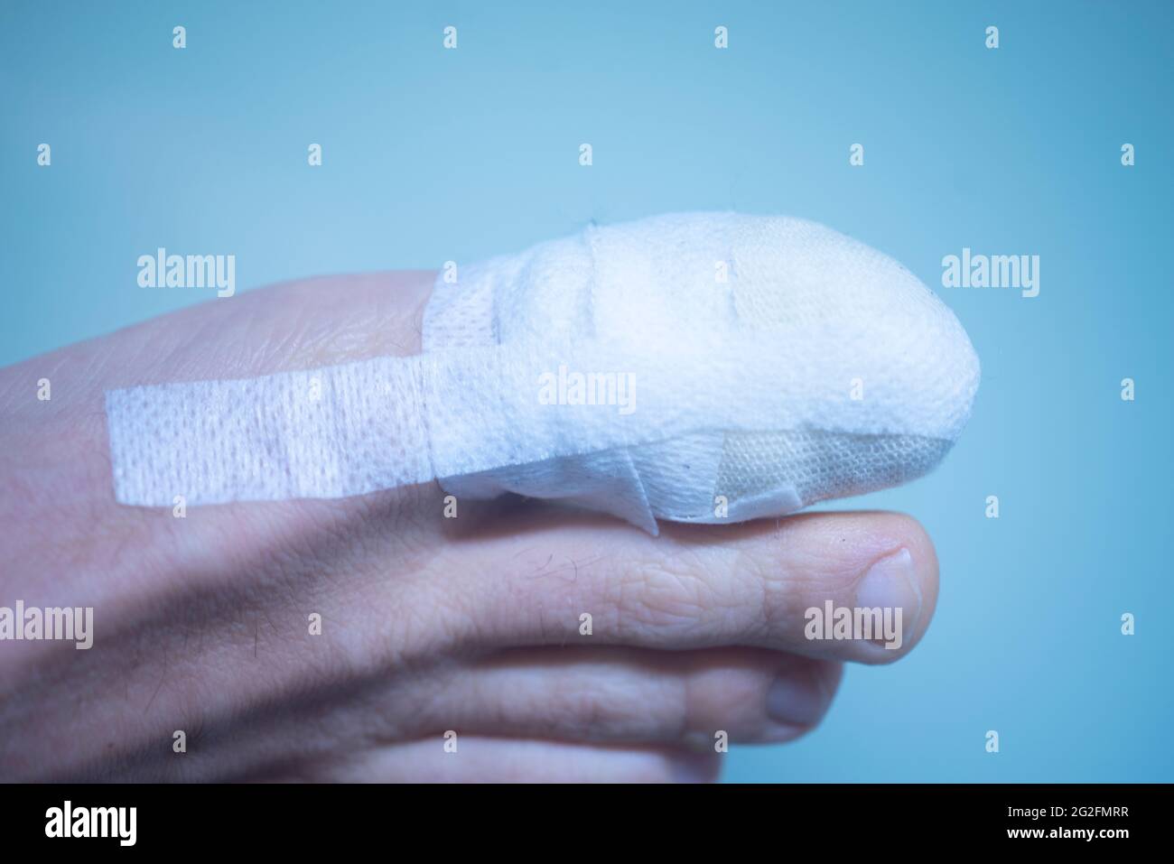 Foot big toe bandage injured feet in medical clinic hospital center