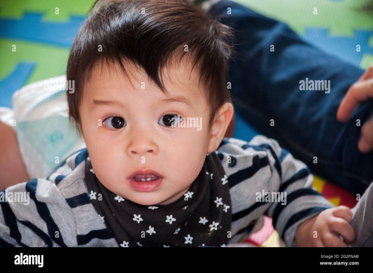 Cute Asian baby boy looking at the camera Stock Photo Alamy