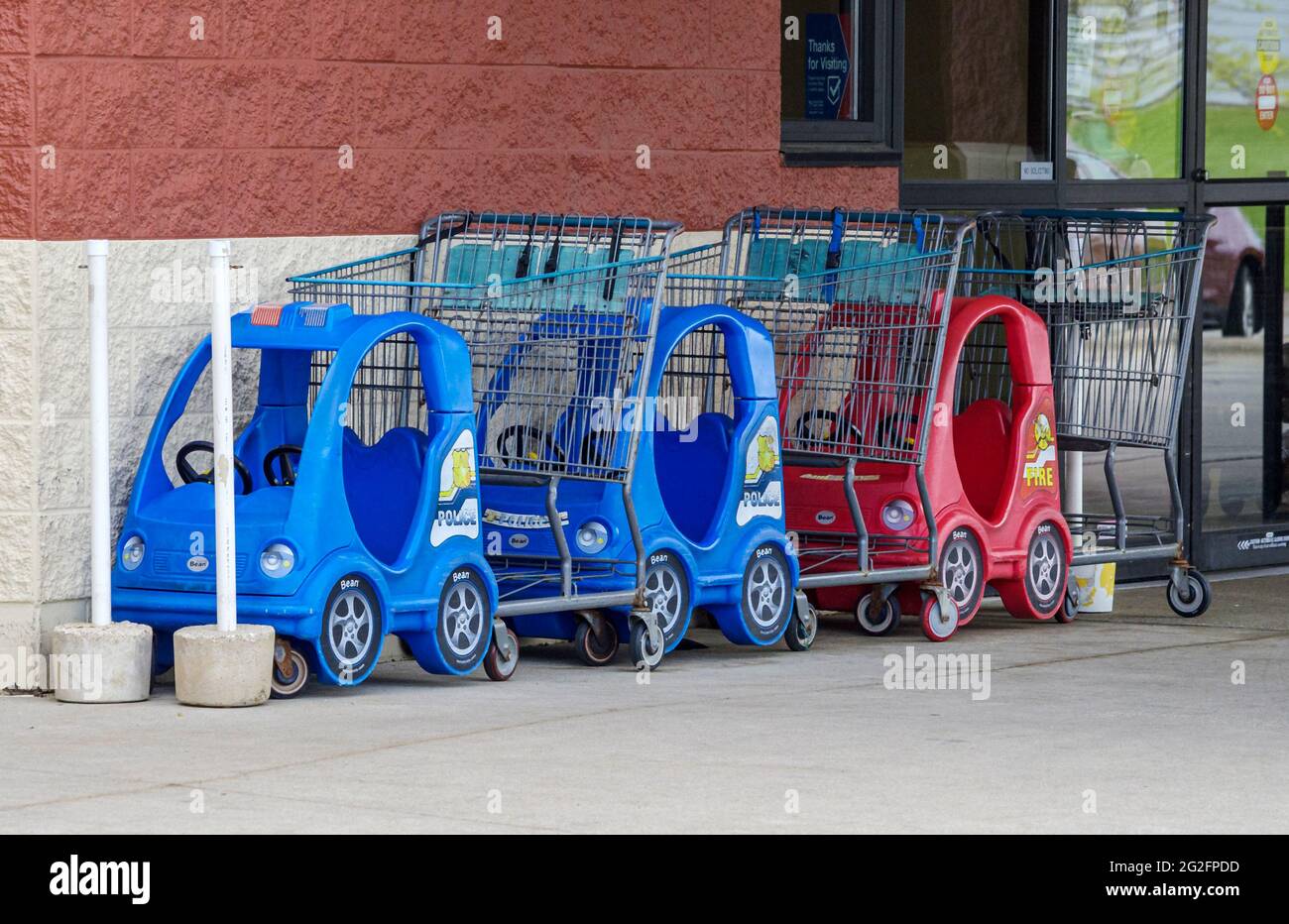 Shopping carts, or trolleys with special seats for young children Stock