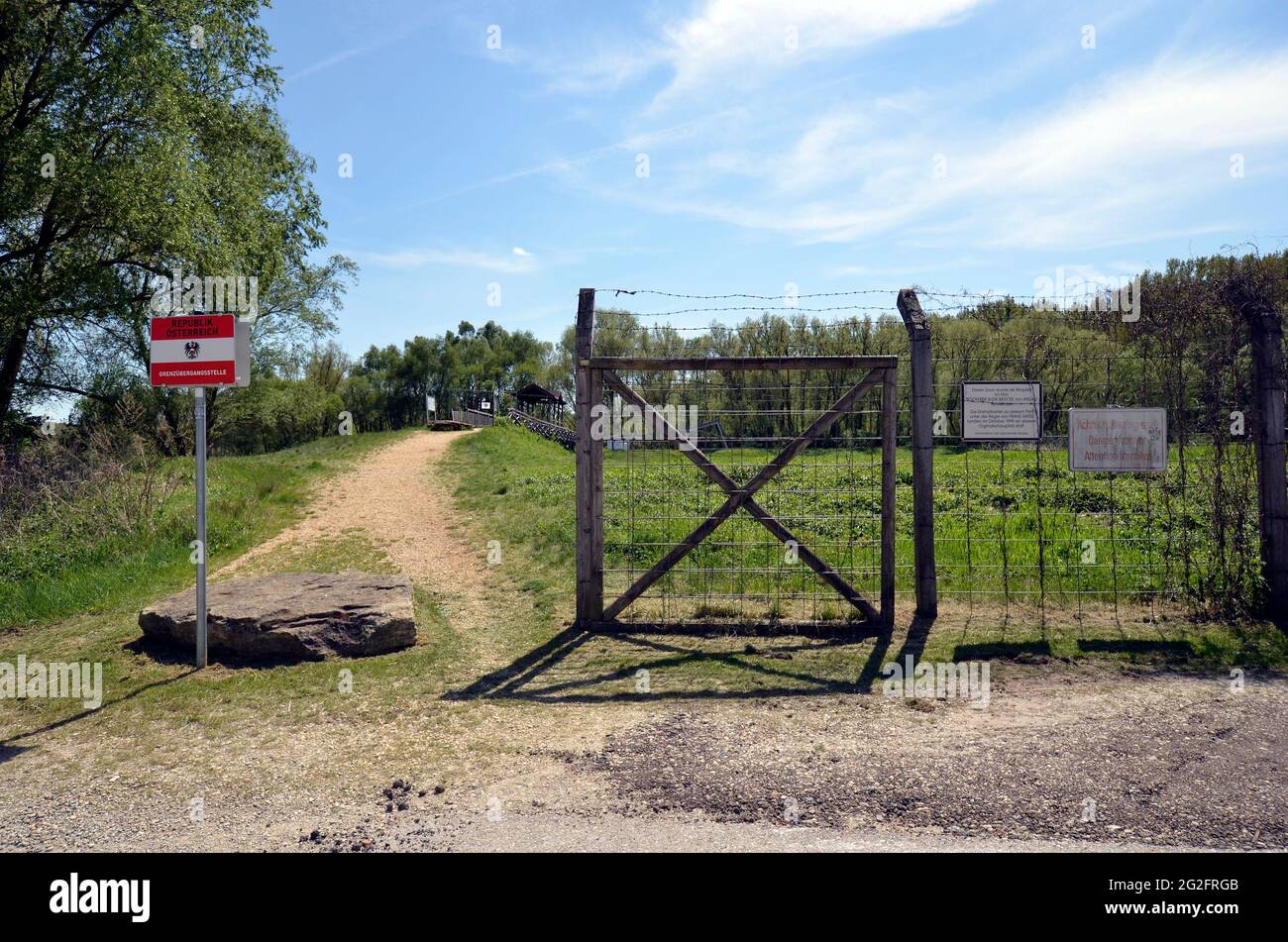 Andau, Austria - May 04, 2021: Border crossing point at the rebuilt historical bridge of Andau crossing Einserkanal river- destroyed by Soviets - wher Stock Photo