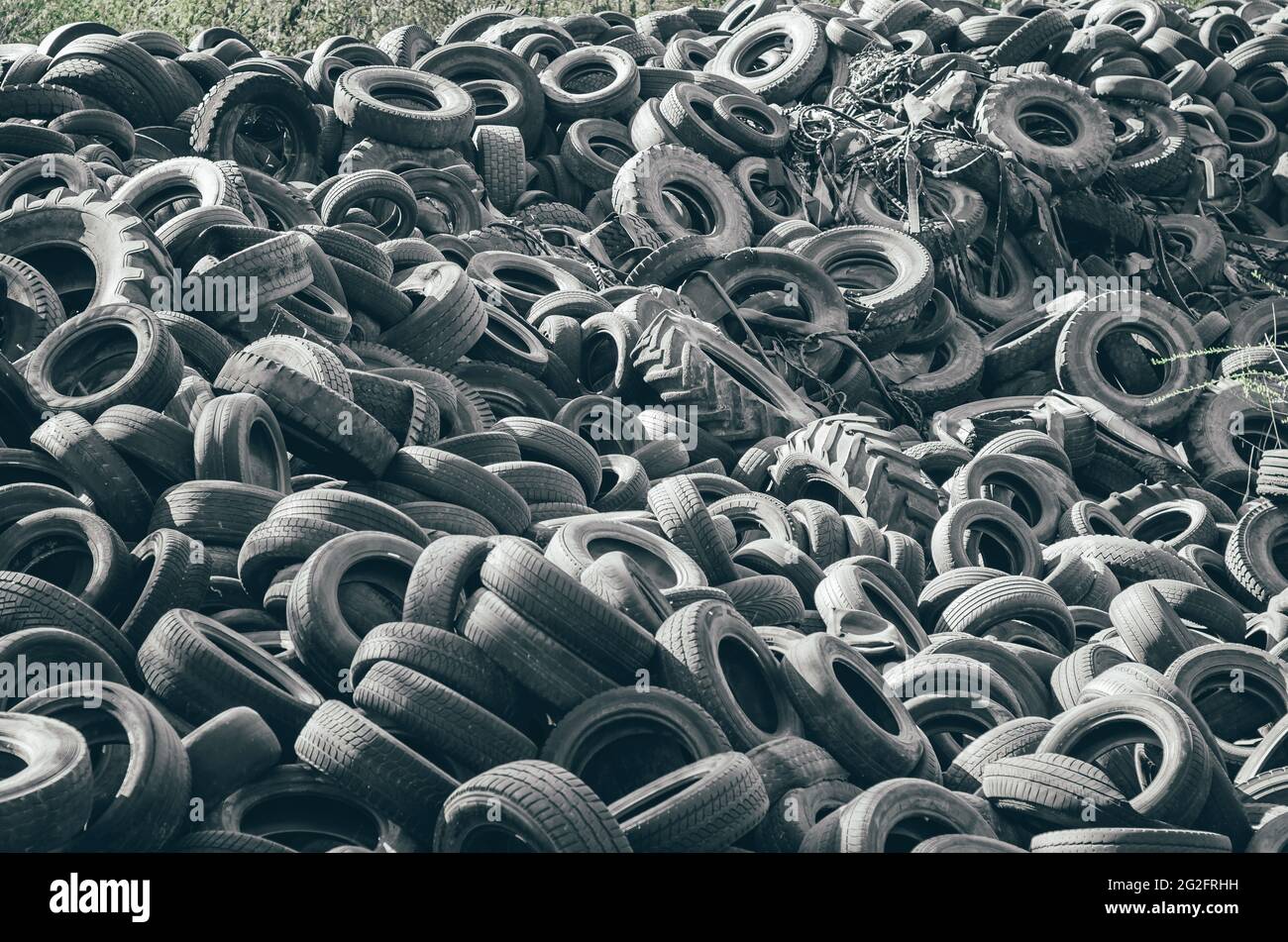 Landfill of old car tires torn spoiled abandoned Stock Photo Alamy