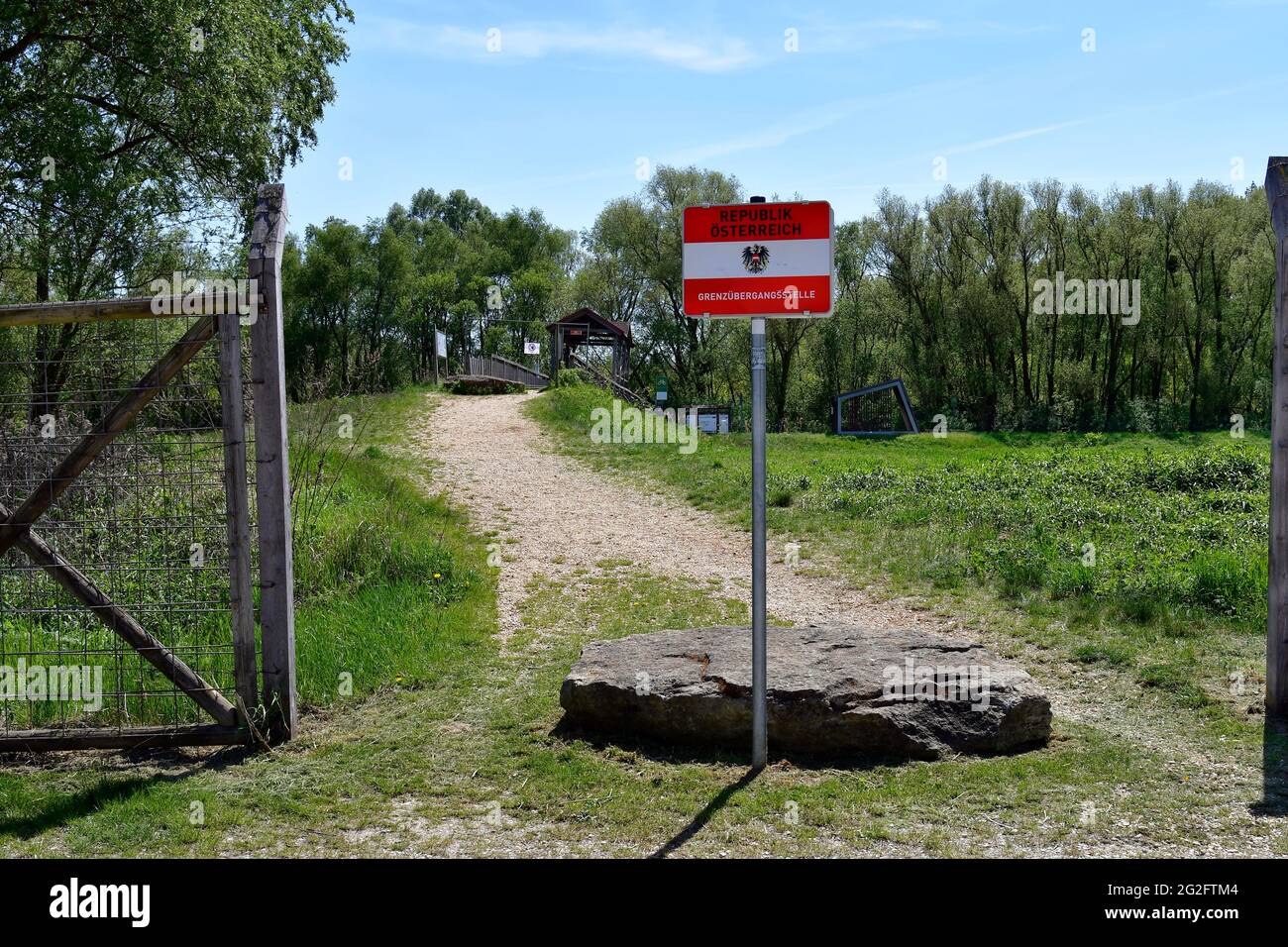 Andau, Austria - May 04, 2021: Border crossing point at the rebuilt historical bridge of Andau crossing Einserkanal river- destroyed by Soviets - wher Stock Photo