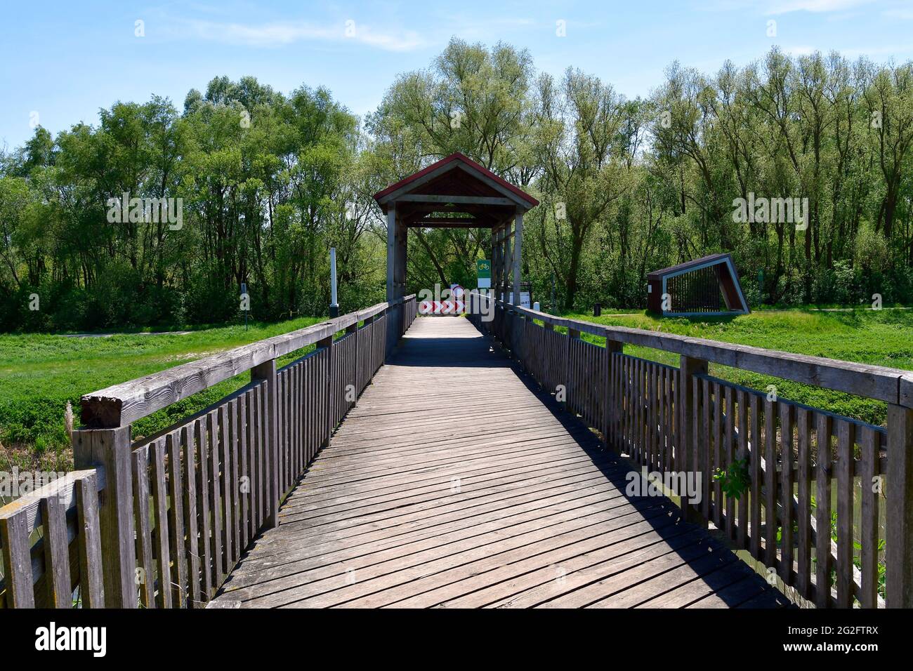 Austria, the rebuilt historical bridge of Andau over Einserkanal river, where the refugees from Hungary fled to Austria in 1956 from the Hungarian rev Stock Photo