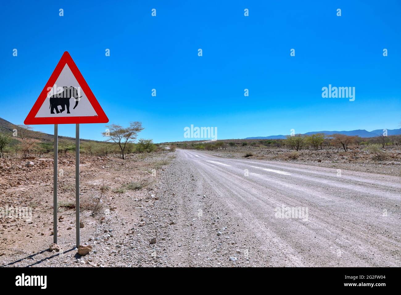 Driving through the Kaokoveld in Namibia Stock Photo