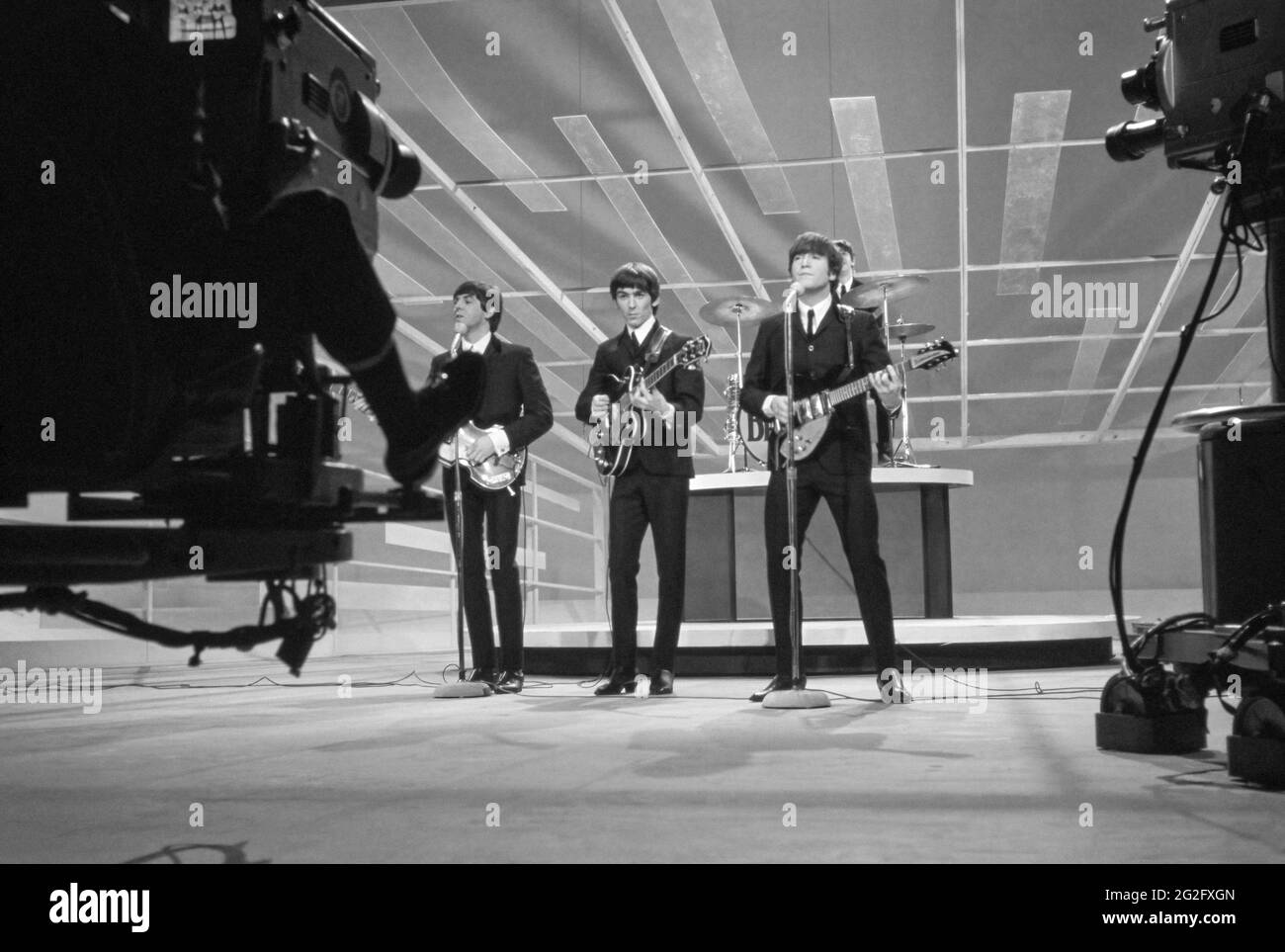 The Beatles performing in the United States on the Ed Sullivan Show on February 9, 1964. Stock Photo