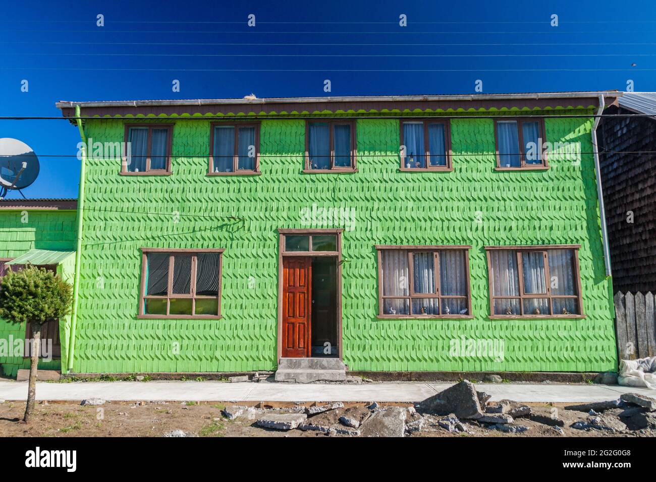 Wooden house in Achao village, Quinchao island, Chile Stock Photo