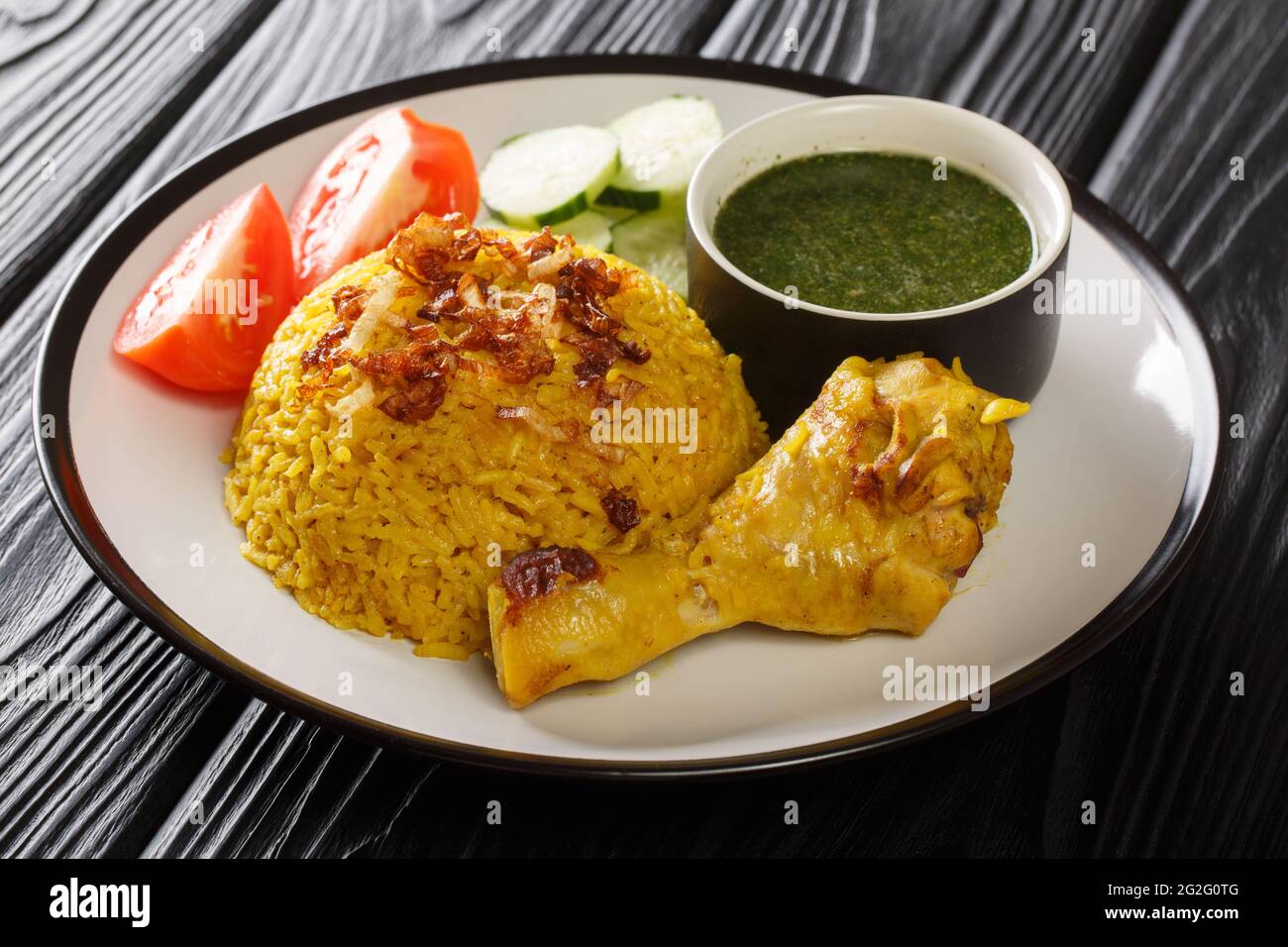 Thai Chicken Biryani Halal Chicken and Curry Rice Khao Mok Gai closeup