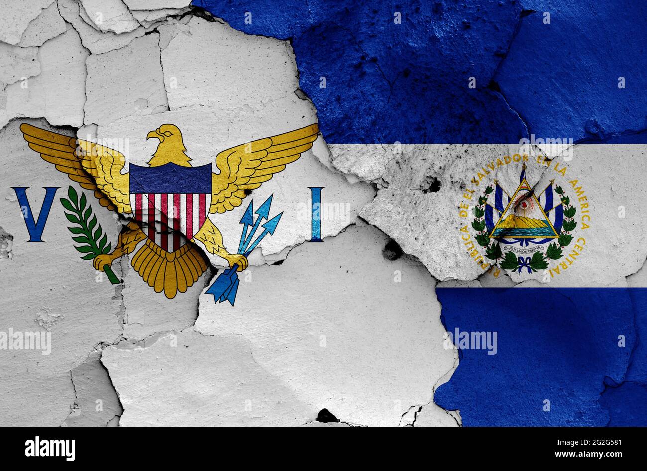 flags of U.S. Virgin Islands and El Salvador painted on cracked wall Stock Photo