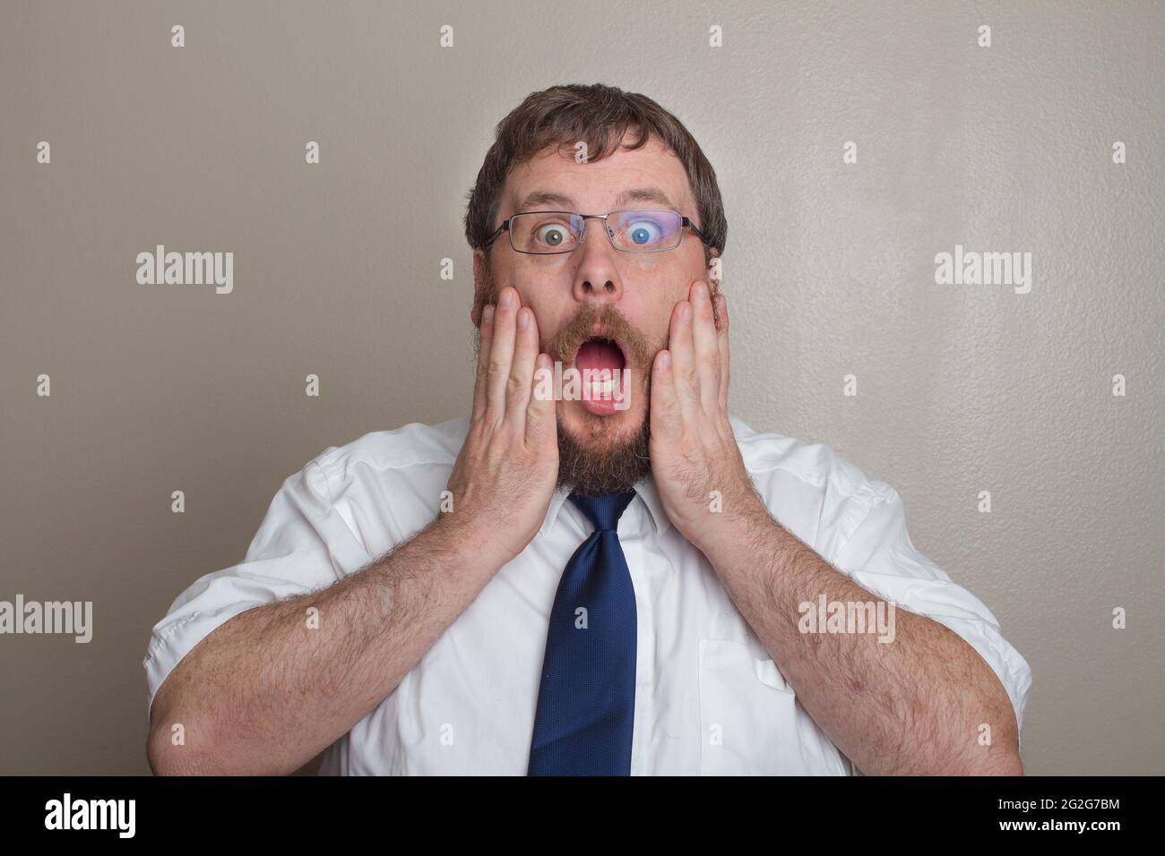 this business man is surprised about something Stock Photo