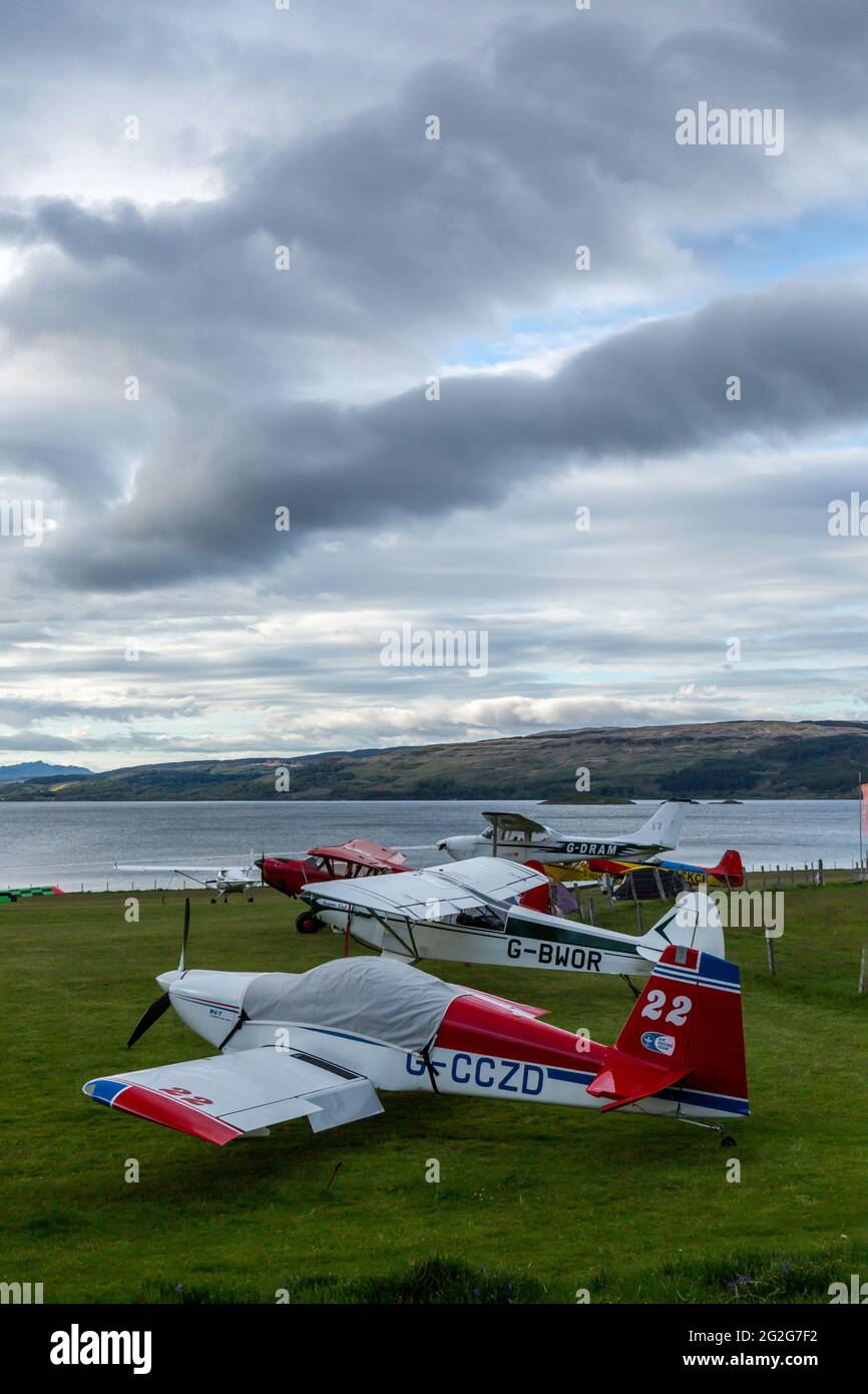 A number of light civilian aircraft at Glenforsa Airfield, Isle of Mull, Scotland. Stock Photo