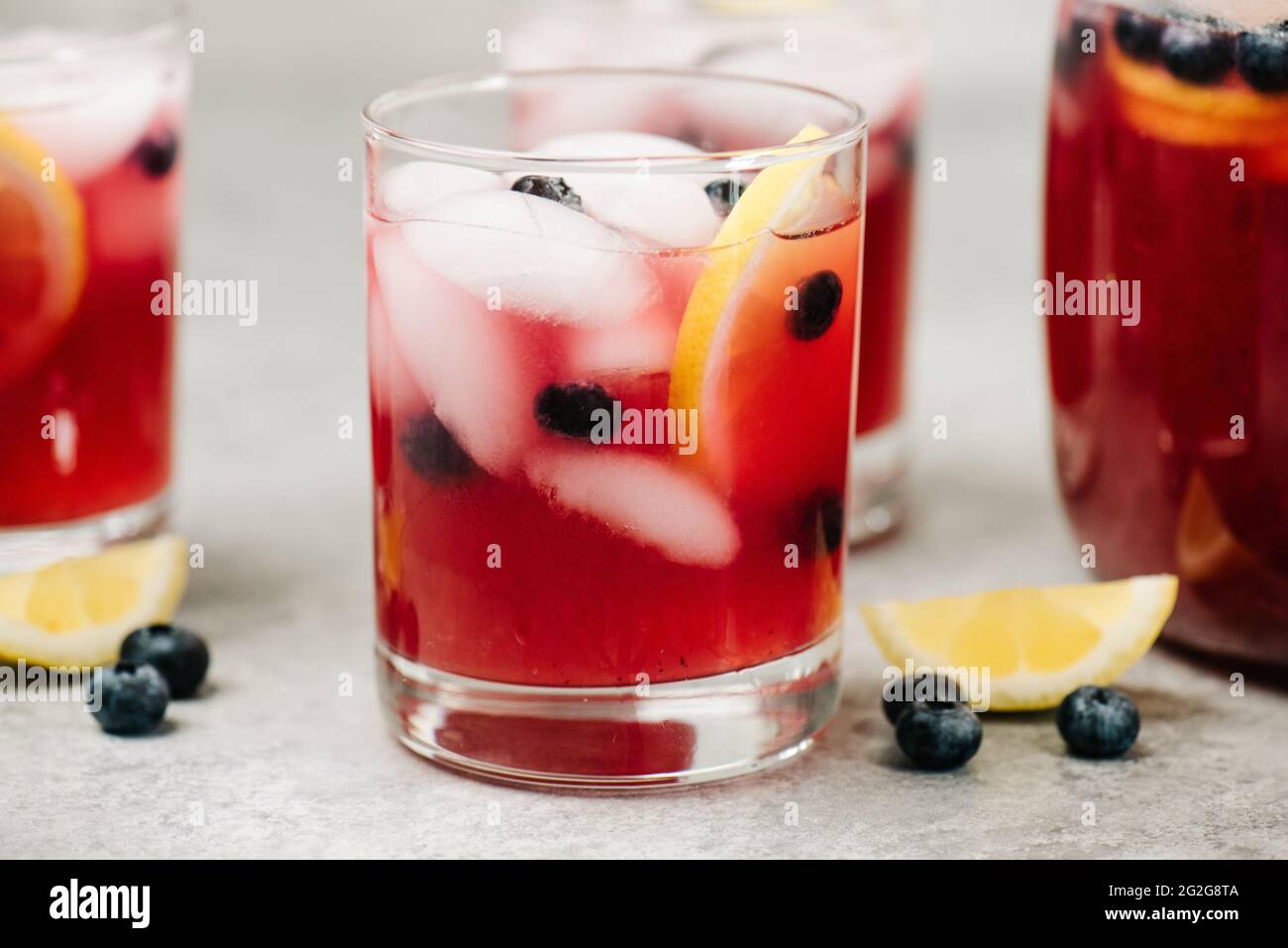 Blueberry lemonade cocktails with blueberries and lemons Stock Photo