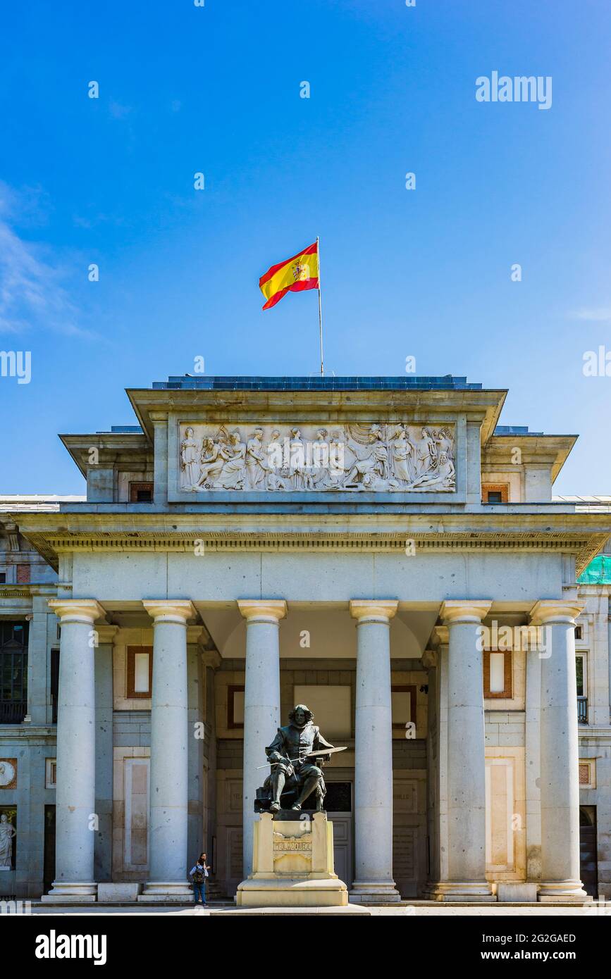 Main entrance of the Prado Museum and in front the statue of the painter Velazquez. The Prado Museum - Museo del Prado, officially known as Museo Naci Stock Photo