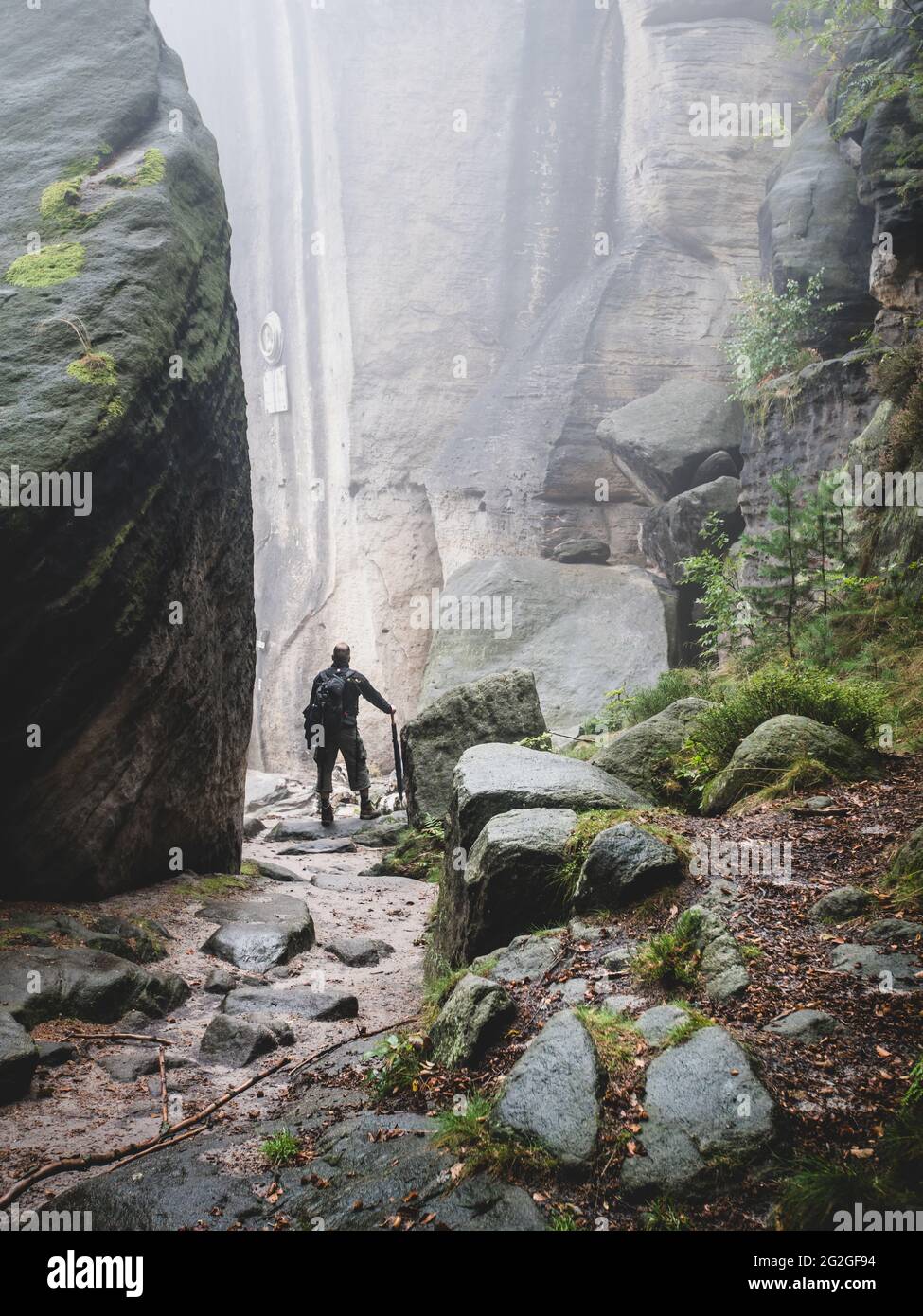 Hikers on the Malerweg in the Elbe Sandstone Mountains. Stock Photo