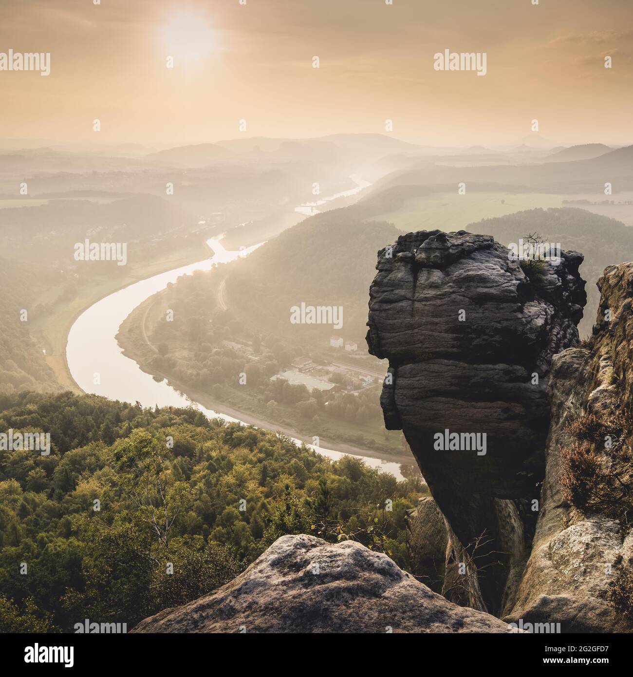 Sunrise view from Lilienstein into the Elbe Valley in the Elbe Sandstone Mountains. Stock Photo