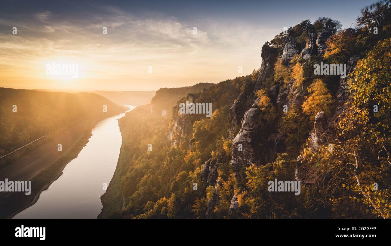 View of the Elbe at sunset from the Bastei in the Elbe Sandstone Mountains. Stock Photo