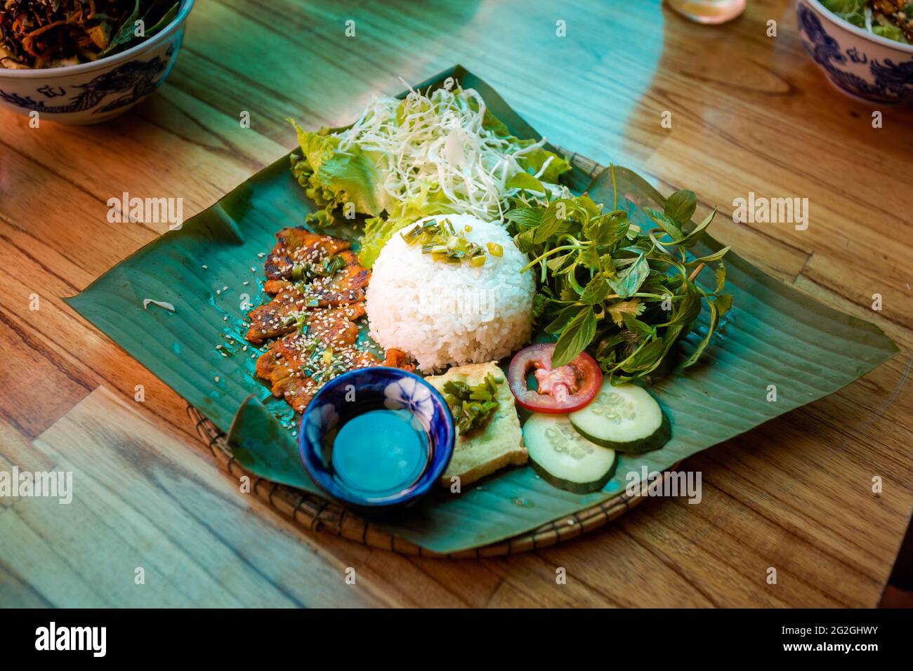 Broken rice with pork chop and vegetables Com Tam Suon.Traditional