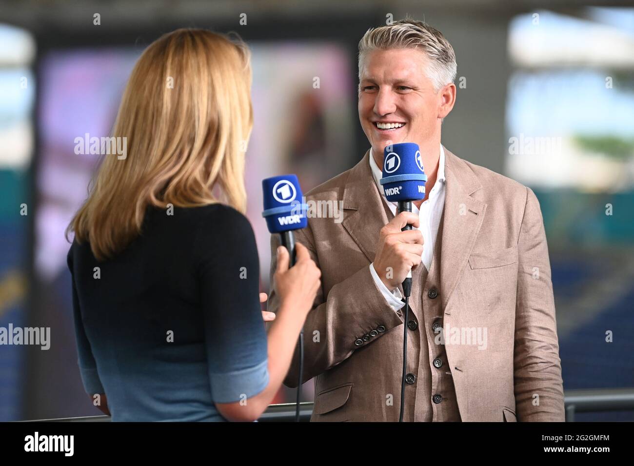 11 June 2021, Lazio, Rom: Football: European Championship, preliminary round, Group A, Turkey - Italy at the Stadio Olimpico di Roma. Jessy Welmer, ARD presenter, and Bastian Schweinsteiger, ARD TV expert, are in the stadium. Important: For editorial news reporting purposes only. Not used for commercial or marketing purposes without prior written approval of UEFA. Images must appear as still images and must not emulate match action video footage. Stock Photo
