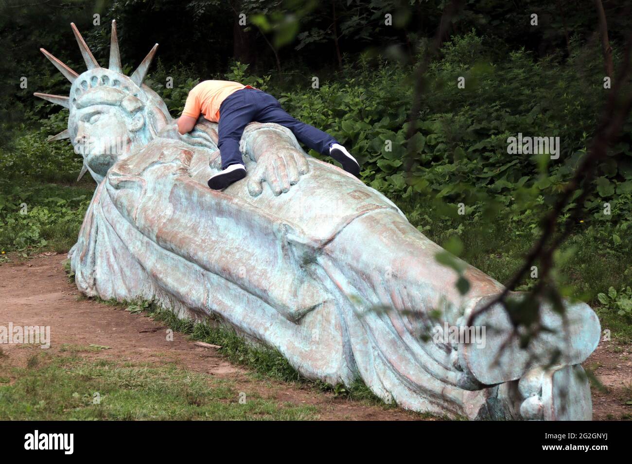 New York City, New York, USA. 11th June, 2021. A 25-foot-long sculpture of  the Statue of Liberty reclining has been installed in a public park in the  Morningside neighborhood of Manhattan. The