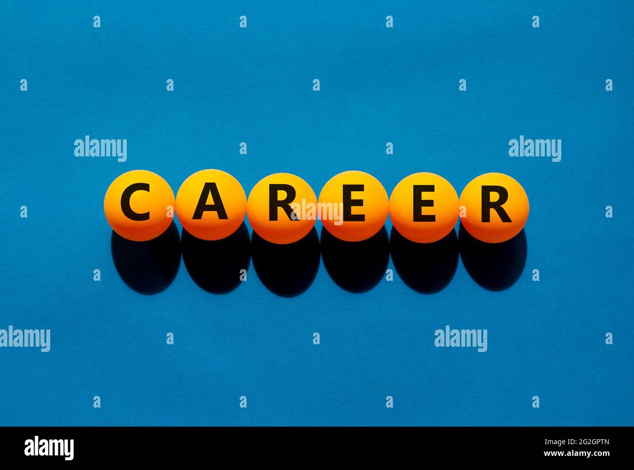 Career and business symbol. The concept word 'career' on orange table ...